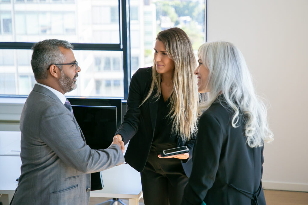 confident business partners meeting in office